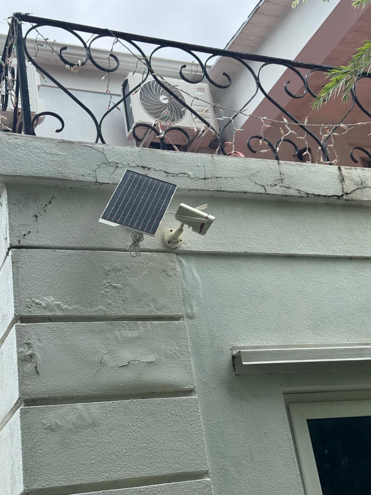 Solar-powered security camera installation